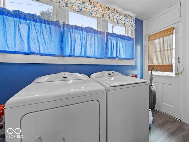 215 N E St, Greensburg, IN 47240 - laundry room featuring washing machine and clothes dryer, healthy amount of natural light, and wood finished floors