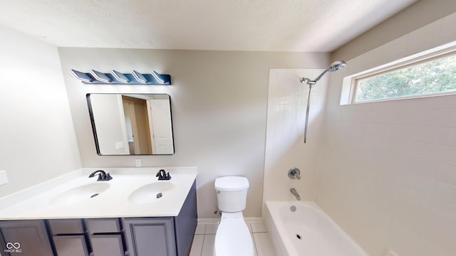 9831 Deering St, Fishers, IN 46037 - bathroom with bathing tub / shower combination, double vanity, tile patterned flooring, and a textured ceiling