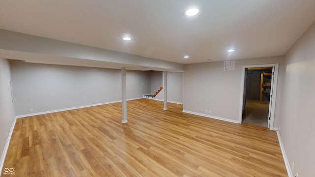 9831 Deering St, Fishers, IN 46037 - finished basement with recessed lighting and light wood-style floors