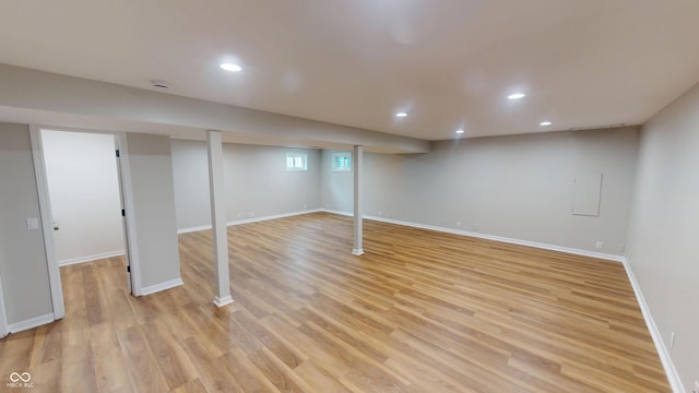 9831 Deering St, Fishers, IN 46037 - below grade area with light wood-style flooring and recessed lighting