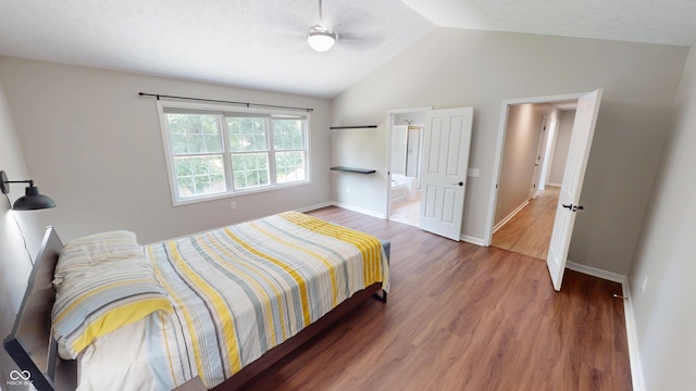 9831 Deering St, Fishers, IN 46037 - bedroom with lofted ceiling, wood finished floors, and ensuite bath
