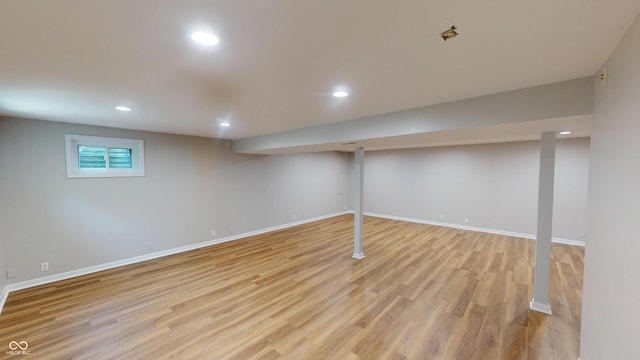 9831 Deering St, Fishers, IN 46037 - below grade area with light wood-type flooring and recessed lighting