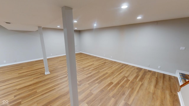 9831 Deering St, Fishers, IN 46037 - finished basement with recessed lighting and light wood-style flooring