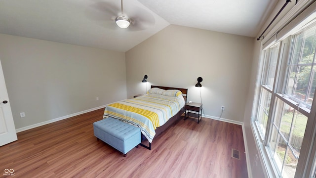 9831 Deering St, Fishers, IN 46037 - bedroom with wood finished floors, vaulted ceiling, and a ceiling fan