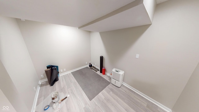 9831 Deering St, Fishers, IN 46037 - laundry room with wood finished floors and baseboards