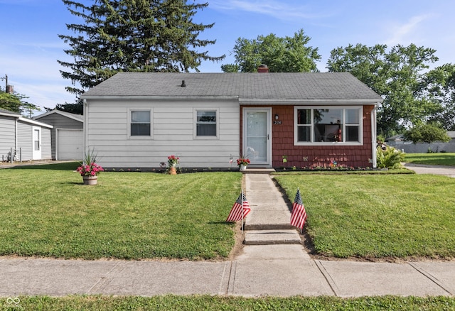 206 Allen Ln, Greenfield, IN 46140 - view of front of house featuring a front lawn and a shingled roof