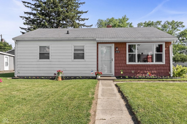 206 Allen Ln, Greenfield, IN 46140 - view of front of house with roof with shingles and a front yard