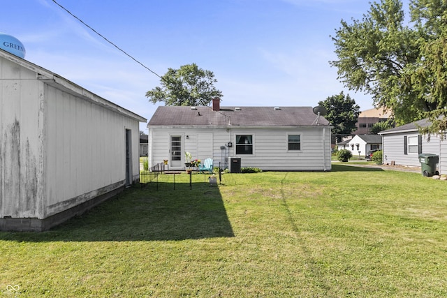 206 Allen Ln, Greenfield, IN 46140 - rear view of property featuring a lawn