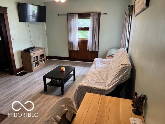 2830 Guilford Ave, Indianapolis, IN 46205 - living area featuring wood finished floors and baseboards