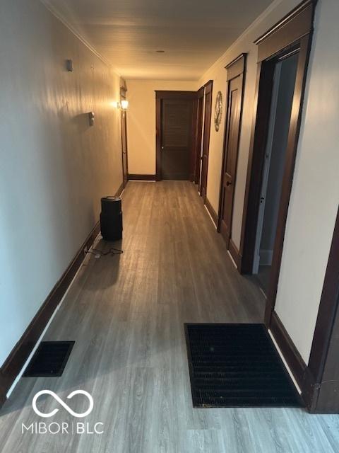 2830 Guilford Ave, Indianapolis, IN 46205 - corridor with wood finished floors and baseboards
