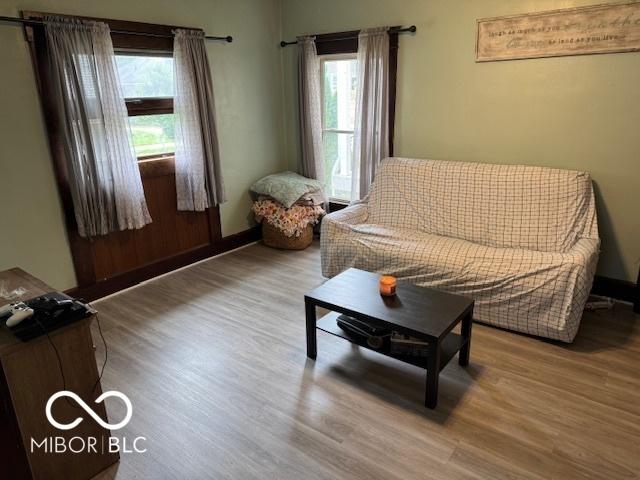 2830 Guilford Ave, Indianapolis, IN 46205 - living room featuring wood finished floors and plenty of natural light