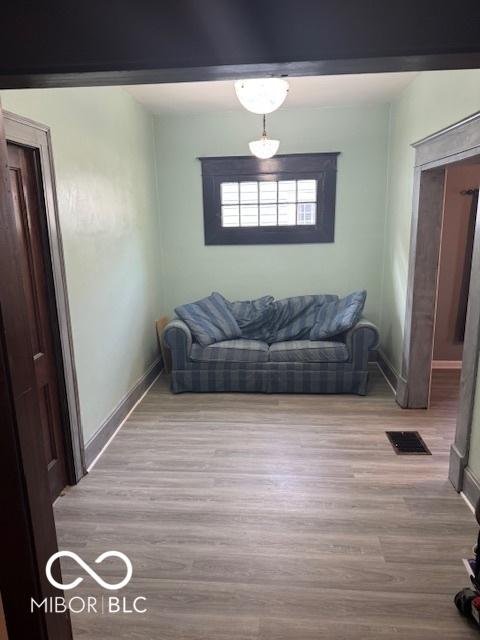 2830 Guilford Ave, Indianapolis, IN 46205 - living room featuring wood finished floors and baseboards