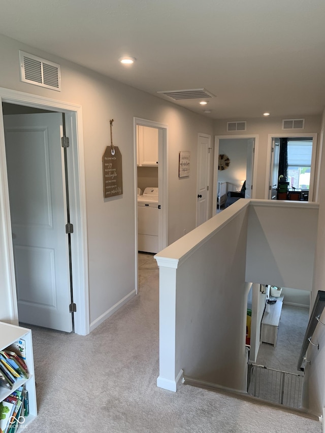 7270 W Stone Pass, New Palestine, IN 46163 - hall with an upstairs landing, light carpet, washer and clothes dryer, and recessed lighting