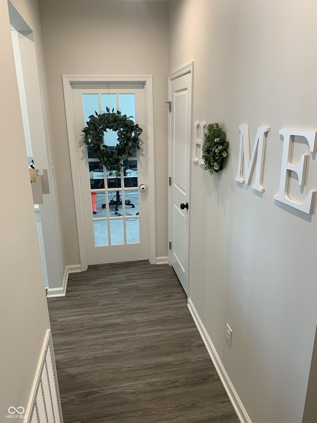 7270 W Stone Pass, New Palestine, IN 46163 - hallway featuring dark wood-type flooring and baseboards