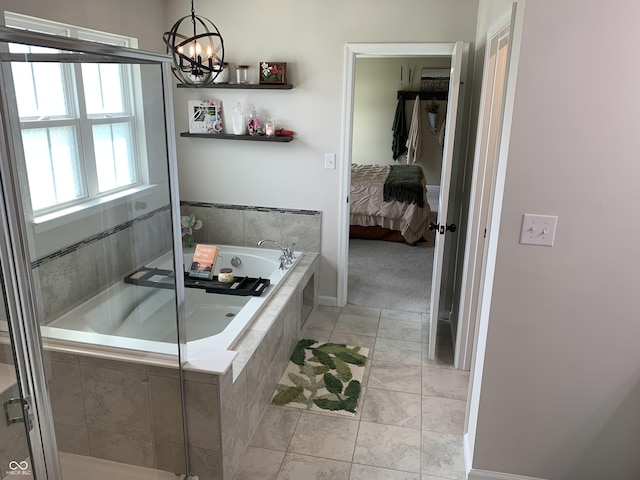 7270 W Stone Pass, New Palestine, IN 46163 - bathroom with a garden tub, ensuite bath, and a chandelier