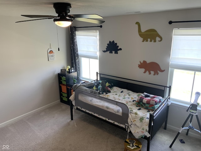 7270 W Stone Pass, New Palestine, IN 46163 - carpeted bedroom with baseboards and a ceiling fan