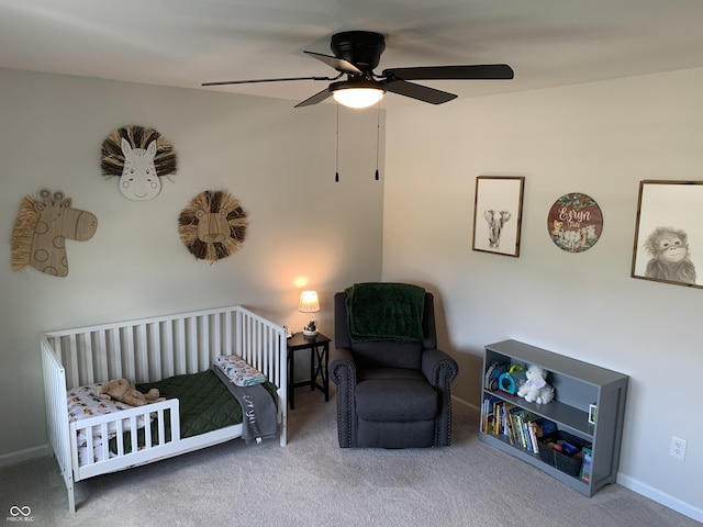 7270 W Stone Pass, New Palestine, IN 46163 - bedroom featuring carpet flooring, a nursery area, and ceiling fan