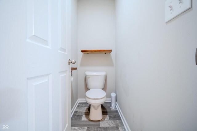 1336 Danielle Rd, Lebanon, IN 46052 - bathroom with toilet and wood finished floors