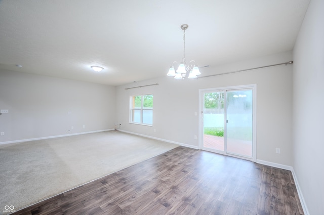 1336 Danielle Rd, Lebanon, IN 46052 - unfurnished room featuring a chandelier and wood finished floors