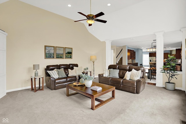 10587 Proposal Pointe Way, Fishers, IN 46040 - carpeted living area featuring decorative columns, ceiling fan, recessed lighting, stairway, and vaulted ceiling