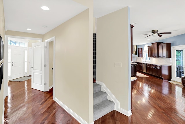 10587 Proposal Pointe Way, Fishers, IN 46040 - corridor with dark wood-style flooring, stairway, and recessed lighting