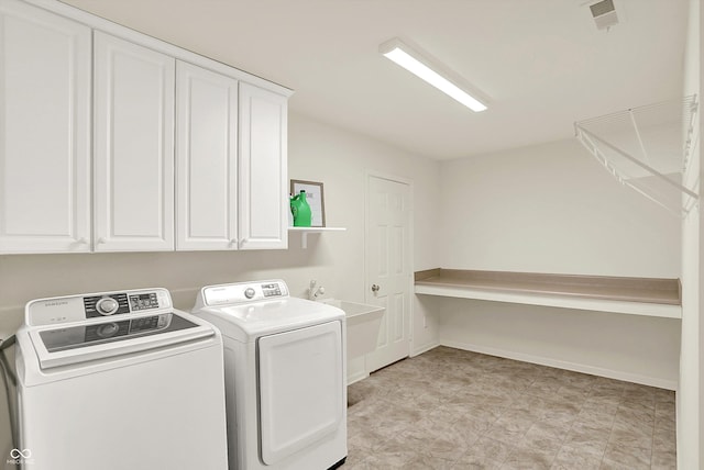 10587 Proposal Pointe Way, Fishers, IN 46040 - laundry area featuring washer and clothes dryer and cabinet space