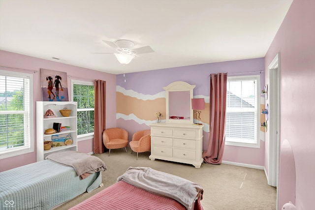 10587 Proposal Pointe Way, Fishers, IN 46040 - bedroom featuring light carpet, multiple windows, and ceiling fan