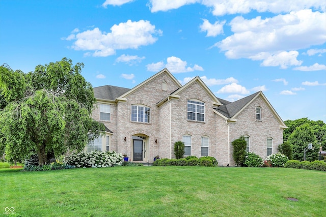 10587 Proposal Pointe Way, Fishers, IN 46040 - view of front of home featuring a front lawn and brick siding
