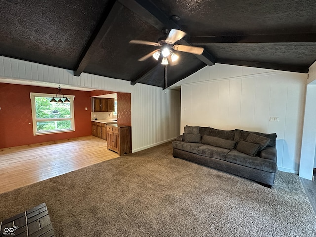 9652 Buckskin Rd, Poland, IN 47868 - living area featuring light colored carpet, a ceiling fan, light wood-type flooring, and a textured ceiling