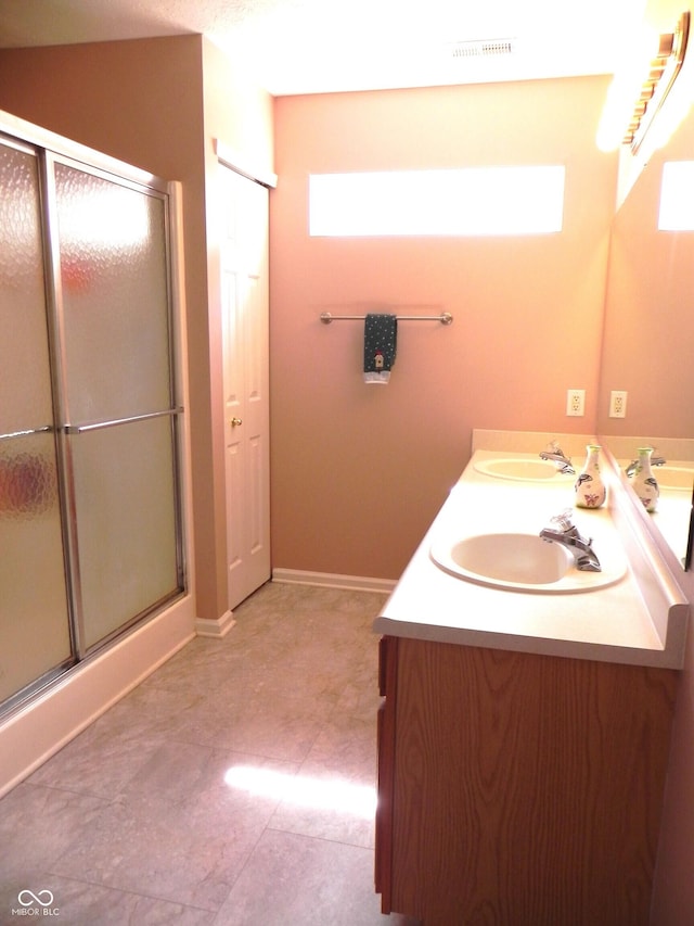 10178 Cornith Way, Avon, IN 46123 - full bath with plenty of natural light, double vanity, and an enclosed shower