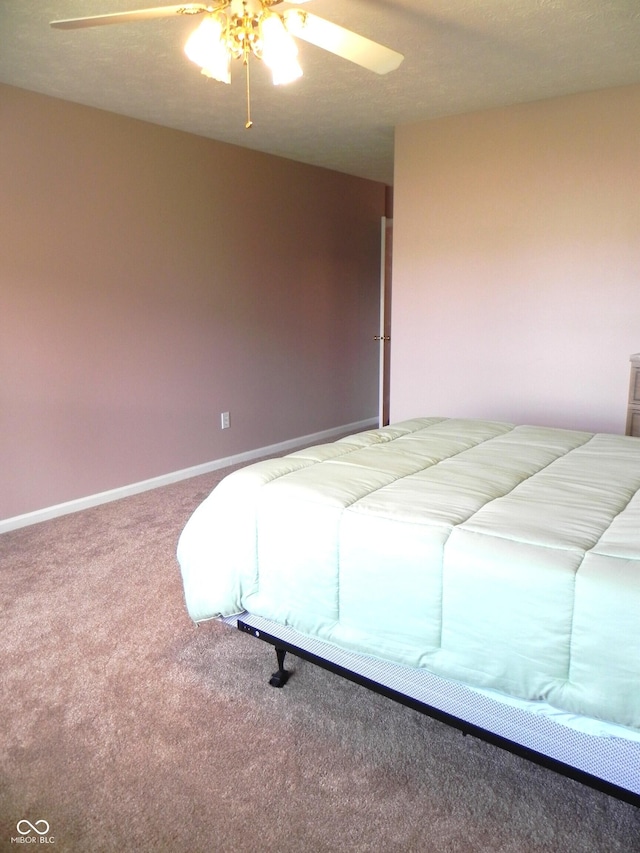 10178 Cornith Way, Avon, IN 46123 - carpeted bedroom with a ceiling fan and baseboards
