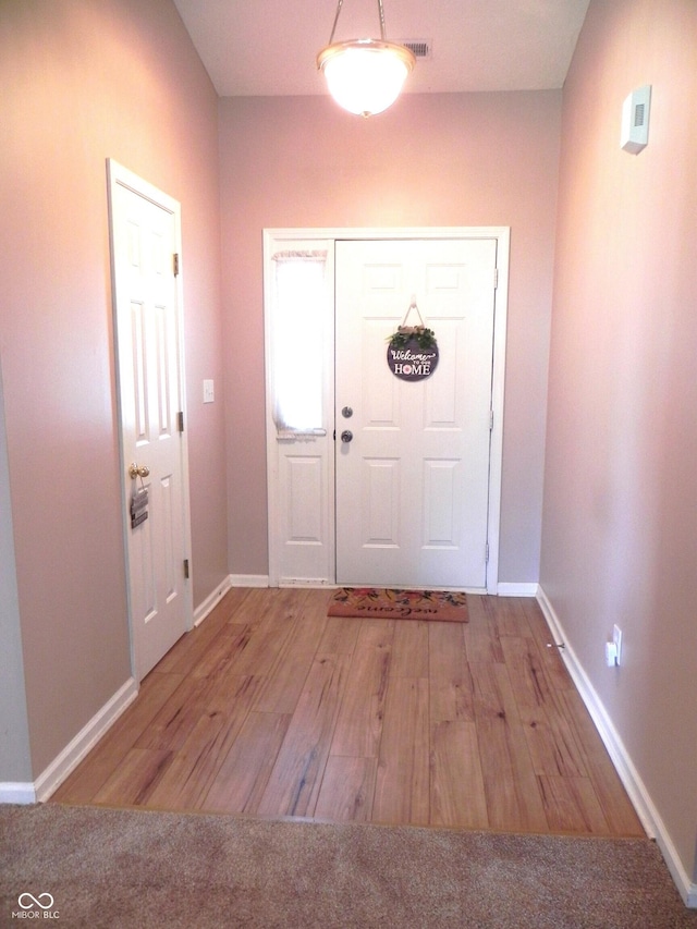 10178 Cornith Way, Avon, IN 46123 - entryway with wood finished floors