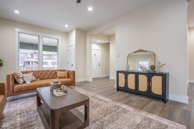 5511 E University Ave, Indianapolis, IN 46219 - living room featuring wood finished floors, healthy amount of natural light, and recessed lighting