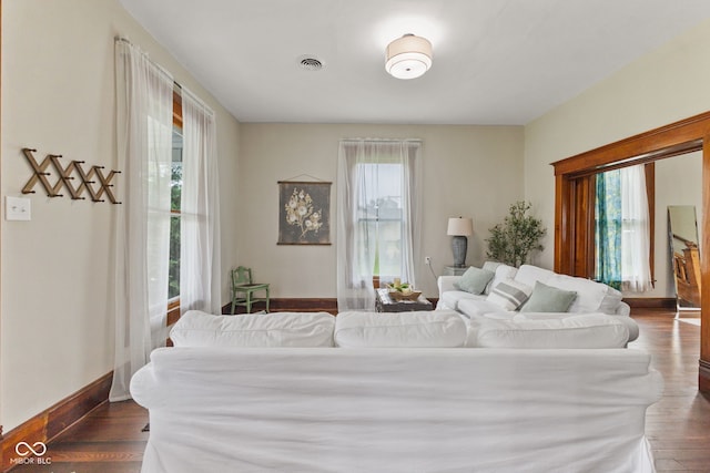 211 N County Line Rd, In, IN 47272 - living room featuring dark wood-style flooring and baseboards