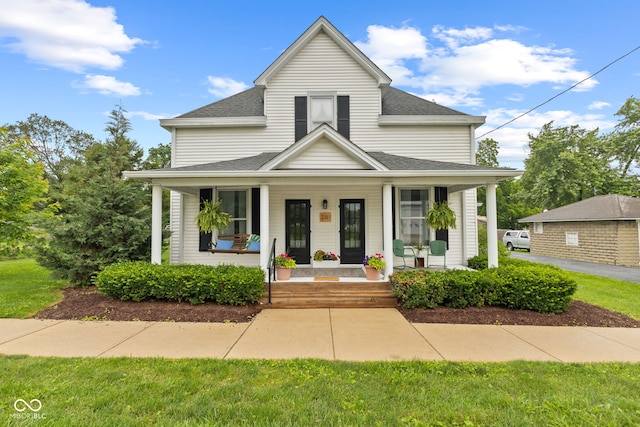 211 N County Line Rd, In, IN 47272 - view of front of home with a porch and a shingled roof