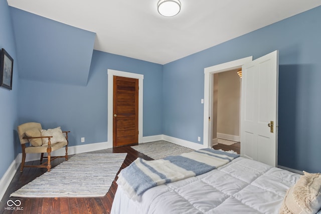 211 N County Line Rd, In, IN 47272 - bedroom with a closet and dark wood-type flooring