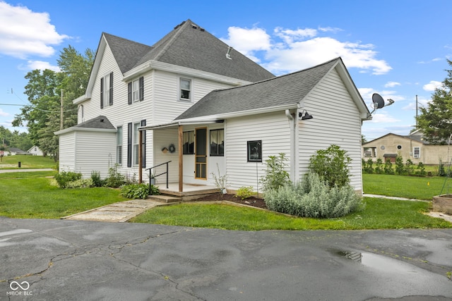 211 N County Line Rd, In, IN 47272 - view of front of property with a shingled roof and a front yard
