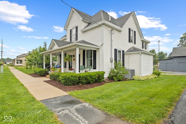 211 N County Line Rd, In, IN 47272 - view of side of home featuring covered porch, a lawn, and a shingled roof