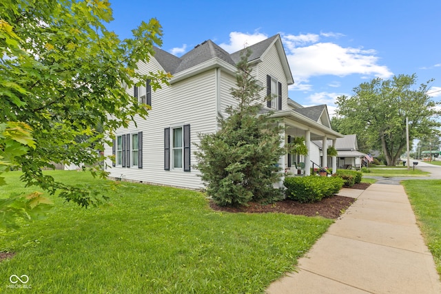 211 N County Line Rd, In, IN 47272 - view of property exterior featuring a yard, roof with shingles, and covered porch