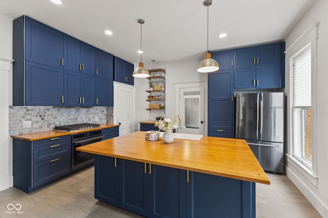 211 N County Line Rd, In, IN 47272 - kitchen with butcher block countertops, freestanding refrigerator, blue cabinets, and recessed lighting