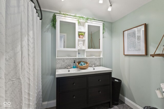 211 N County Line Rd, In, IN 47272 - full bathroom featuring double vanity and tasteful backsplash