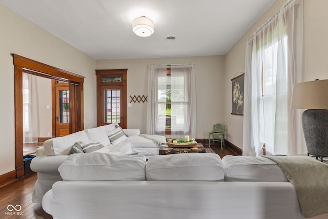 211 N County Line Rd, In, IN 47272 - living area with dark wood-style floors and baseboards