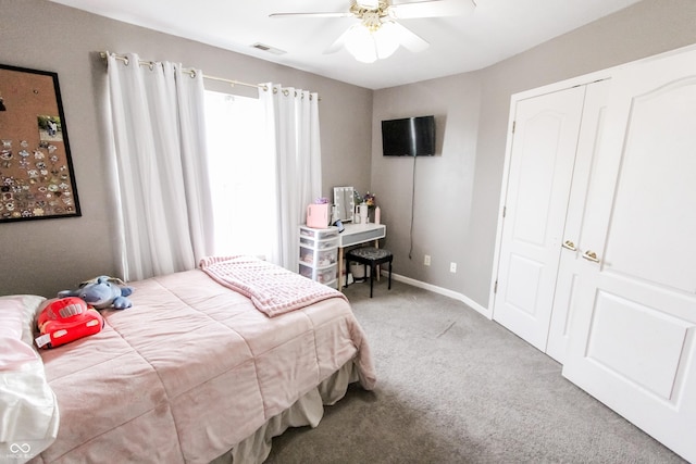 7710 Samuel Dr, Indianapolis, IN 46259 - carpeted bedroom with ceiling fan and a closet