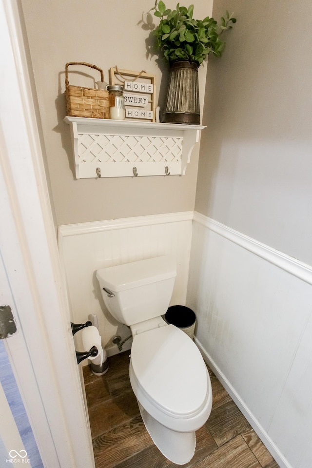 7710 Samuel Dr, Indianapolis, IN 46259 - bathroom featuring wood finished floors and a wainscoted wall