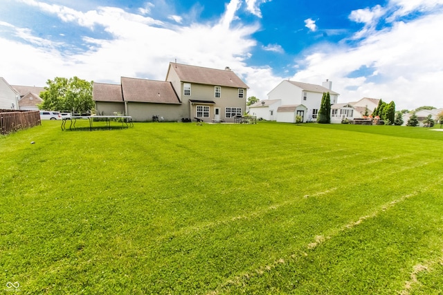7710 Samuel Dr, Indianapolis, IN 46259 - view of yard with a trampoline and a residential view