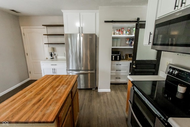 7710 Samuel Dr, Indianapolis, IN 46259 - kitchen with appliances with stainless steel finishes, open shelves, wooden counters, dark wood-type flooring, and white cabinets