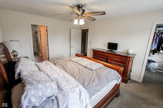 7710 Samuel Dr, Indianapolis, IN 46259 - bedroom featuring a spacious closet, a closet, carpet floors, a ceiling fan, and ensuite bathroom