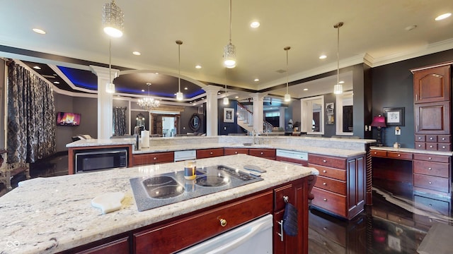 3306 Mullinix Rd, Greenwood, IN 46143 - kitchen featuring ornate columns, ornamental molding, electric stovetop, a spacious island, and reddish brown cabinets