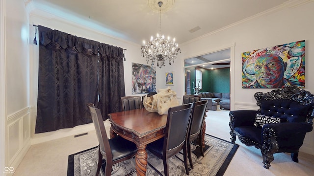 3306 Mullinix Rd, Greenwood, IN 46143 - carpeted dining space featuring a chandelier and ornamental molding