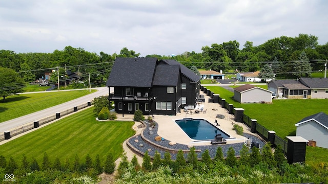 3306 Mullinix Rd, Greenwood, IN 46143 - rear view of property with a balcony, a patio area, and a fenced backyard